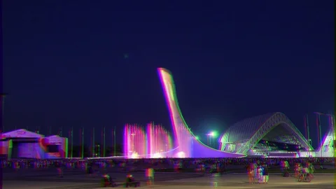 Glitch effect. The main Olympic torch, Night. Sochi, Russia Stockbeeldmateriaal 107080541
