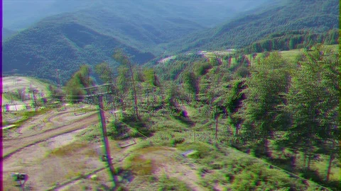 Glitch effect. Ski slopes in summer. Lift. Rosa Khutor. Russia, Sochi Stock Footage 106819062