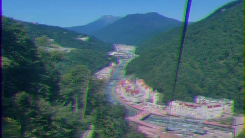 Glitch effect. View Rosa Khutor from the cableway Olympia, Sochi, Russia Vídeo Stock 106819306