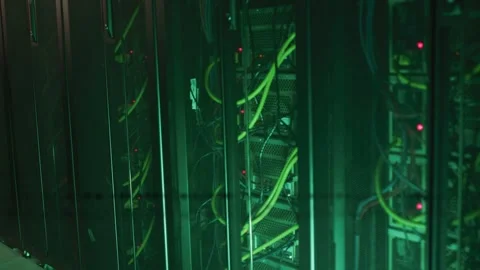 Glitch sweeping across frame, server racks revealing yellow cables and red LEDs 動画素材 333169274