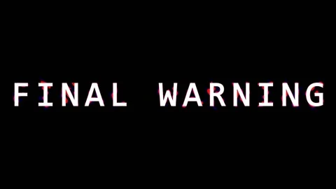 Glitchy text warning loop with digital distortion and particle effects on b.. Stock Footage 344032248