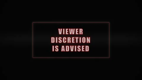 Glitchy viewer discretion is advised message in red outline. 4K Video stock 343265074