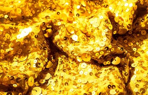 Glitter background. Fabric texture with spangles. Background sequin. Glitter  Stock Photos