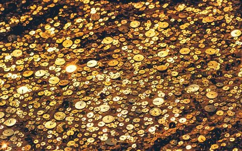 Glitter background. Fabric texture with spangles. Background sequin. Glitter  Stock Photos