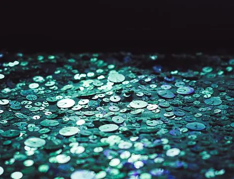 Glitter background. Fabric texture with spangles. Background sequin. Glitter  Stock Photos