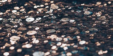 Glitter background. Fabric texture with spangles. Background sequin. Glitter  Stock Photos