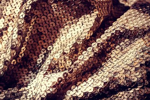 Glitter background. Fabric texture with spangles. Background sequin. Glitter  Stock Photos