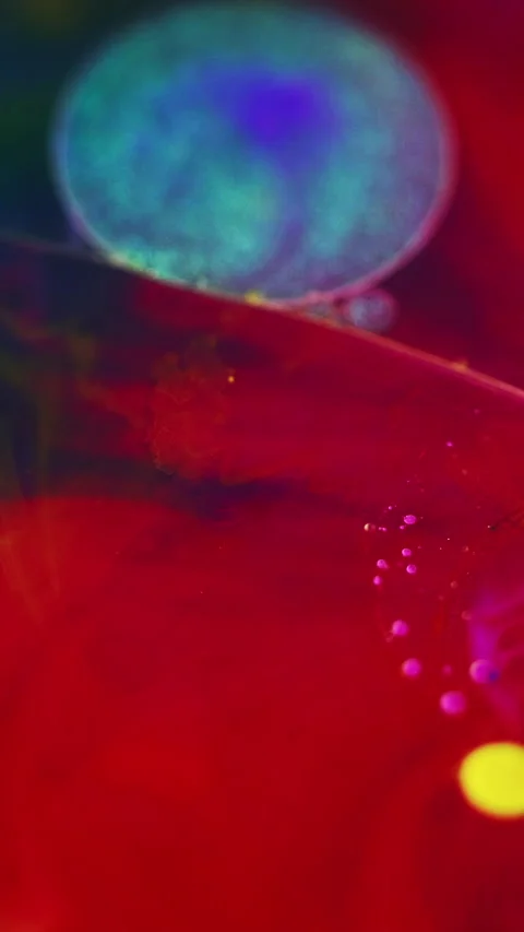 Glitter bubble gel fluid drop paint water red blue Video stock 275306402