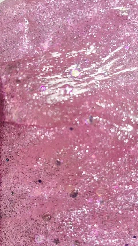 Glitter .Face mask texture macro. Pink cream with glitter. Stock Footage 312690910