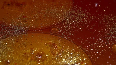 Glitter Falling On Oil Sparkly Background Stock Footage 58549228