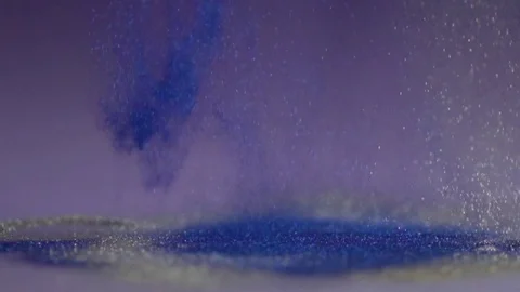 Glitter falls to the surface. Stock Footage