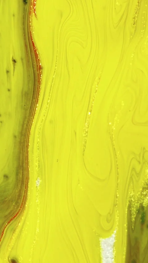 Glitter fluid drip ink wave bright yellow paint Video stock 275126428