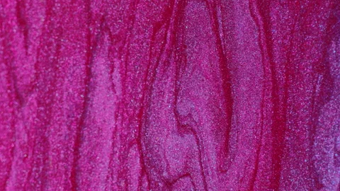 Glitter fluid drip paint flow pink shiny texture Stock Footage 253893404