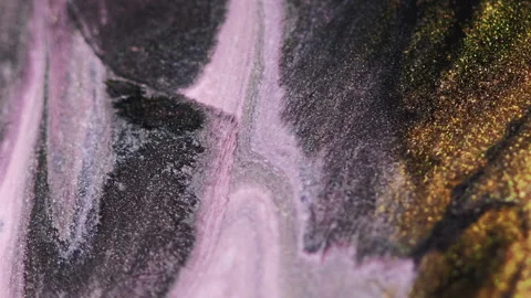 Glitter fluid flow marble paint golden violet mix Stock Footage 257739122