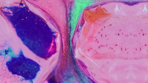 Glitter fluid mix gel bubbles neon pink blue paint Stock Footage 274518454