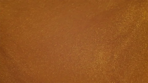 Glitter fluid motion background. Sparkling yellow liquid paint. Shine glitter Stock Footage 274028806