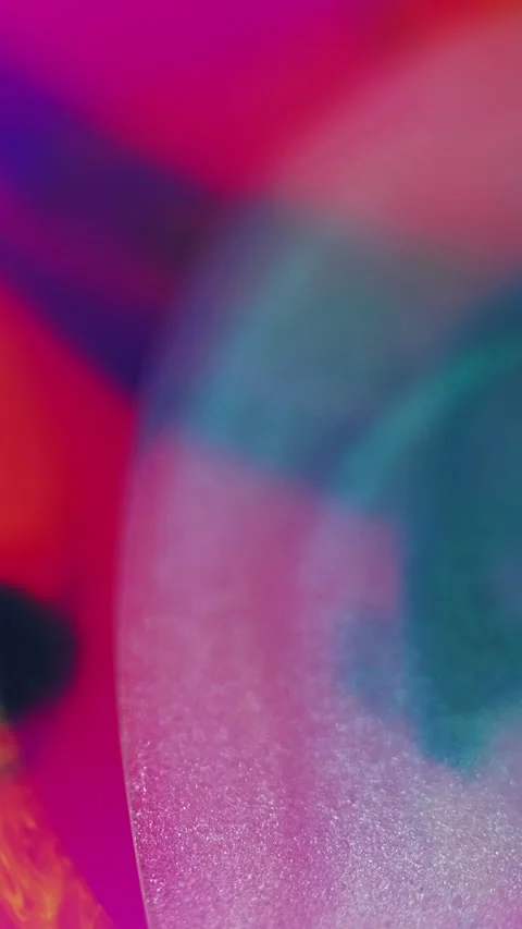 Glitter fluid oil bubble pink blue paint drop flow Stock Footage 274449555