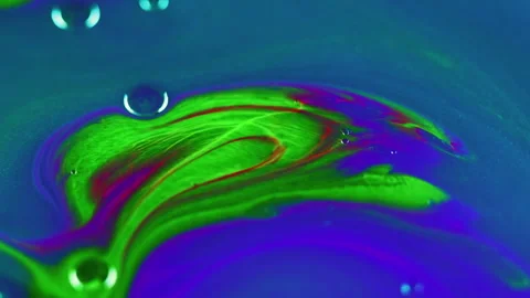 Glitter fluid paint bubbles green oil liquid mix Stock Footage 262505465