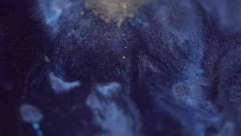Glitter fluid wave ink drip black blue paint flow Stock Footage 281703054