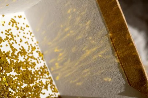 Glitter in a gift box Stock Photos
