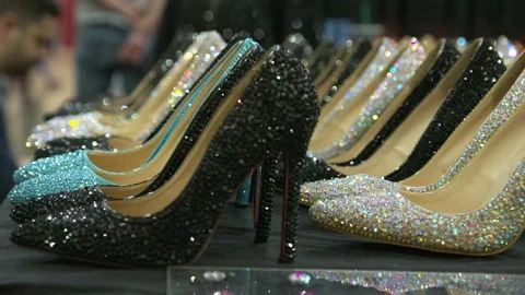 Glitter high heels arranged in row at RuPaul's DragCon event Stock Footage 84507726