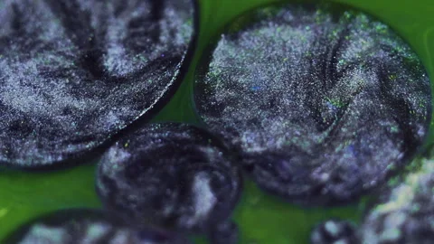 Glitter ink background floating paint oil spill Video stock 260791655