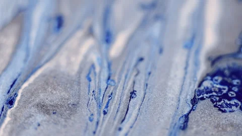 Glitter ink drip marble texture blue silver paint Stock Footage 264162647