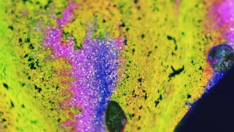 Glitter ink drip paint flow neon yellow fluid mix Stock-Footage 268776935