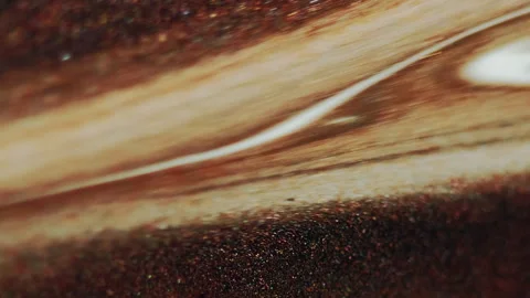 Glitter ink drip paint pouring brown white spill Stock Footage 269832674