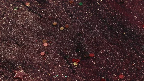 Glitter ink flow color fluid mix fluorescent paint Stock Footage 221824381