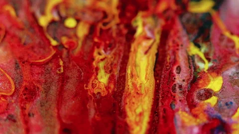 Glitter ink flow paint mix red yellow fluid wave Stock Footage 256056068