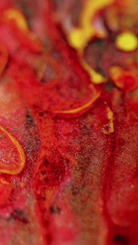 Glitter ink flow paint spill water red yellow wave Video stock 274517903