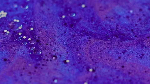 Glitter ink gradient liquid blue purple foam drops Stock Footage 279409449