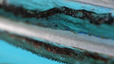 Glitter ink spill paint blend water blue black mix Stock-Footage 283612870