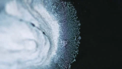 Glitter ink spill shiny paint wave black white mix Stock Footage 287942426