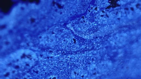 Glitter ink wave paint flow blue fluid spill black Stock Footage 279701498