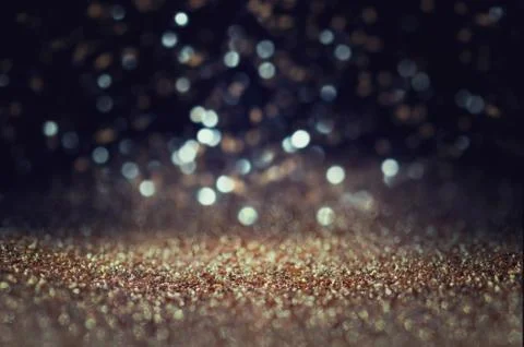 Glitter light background. gold, silver, blue and black. de-focused. Stock Photos
