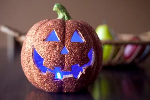 Glitter Light Up Jack O Lantern on Table Stock Photos
