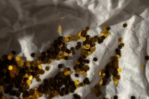 Glitter on a light surface Stock Photos