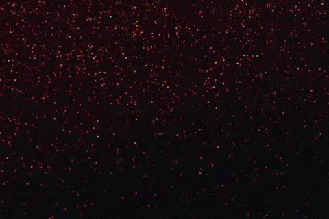 Glitter lights on black background Stock Photos
