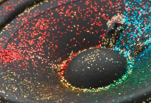 Glitter on loudspeaker Stock Photos
