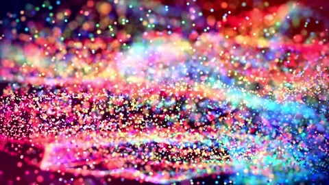 Glitter magic multicolored particles fly and glow in viscous liquid with amazing Stock Footage 130179232