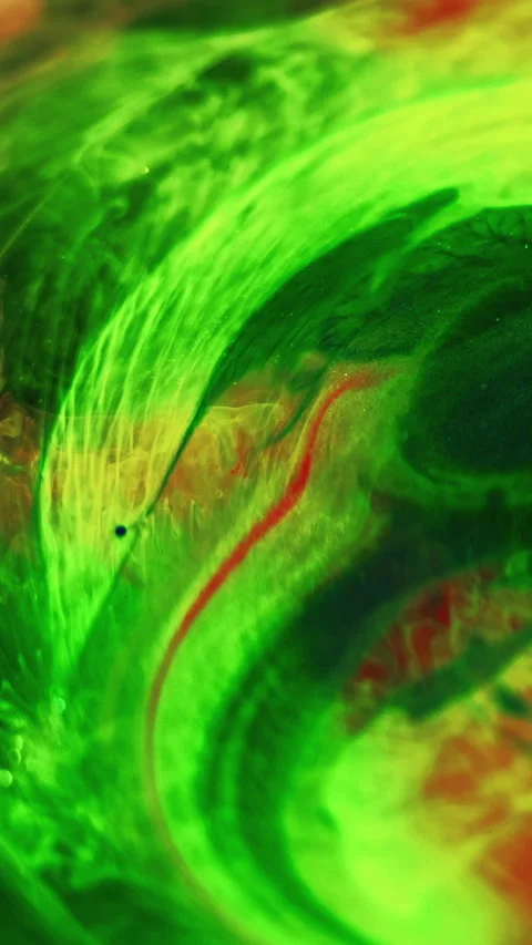 Glitter mist ink water bubble green red paint mix Video stock 274460715