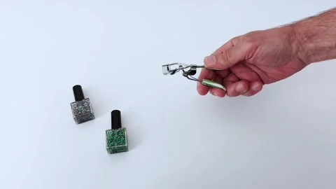 Glitter Nail Polish Hack Using an Eyelash Curler- Beauty Tip Stock Footage 311974335