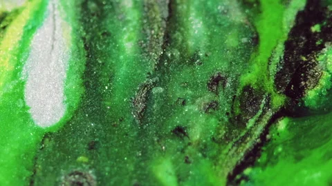 Glitter paint blend marble texture green black ink Video stock 275003740