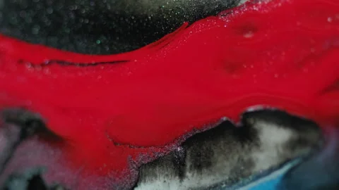 Glitter paint drip ink spill pink blue fluid drop Video stock 282332119