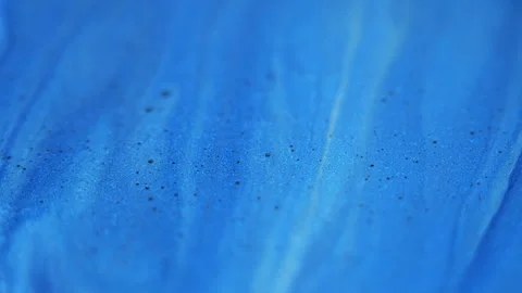 Glitter paint flow fluid spill blue foam wave art Stock Footage 282759531