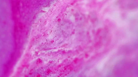 Glitter paint flow ink spill purple white mix wave Stock Footage 278846984