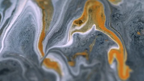 Glitter paint spill marble texture gray orange ink Video stock 276933438
