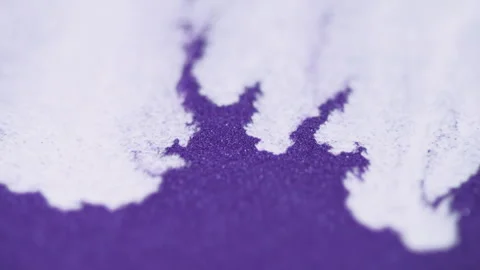 Glitter paint spill particles texture white purple Video stock 281813107